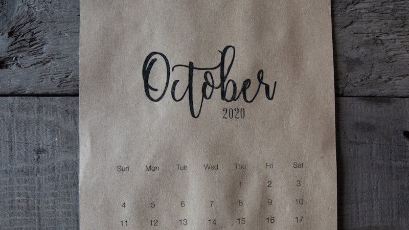 October Calendar On Wooden Surface