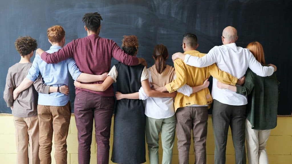 Group of People Standing Indoors