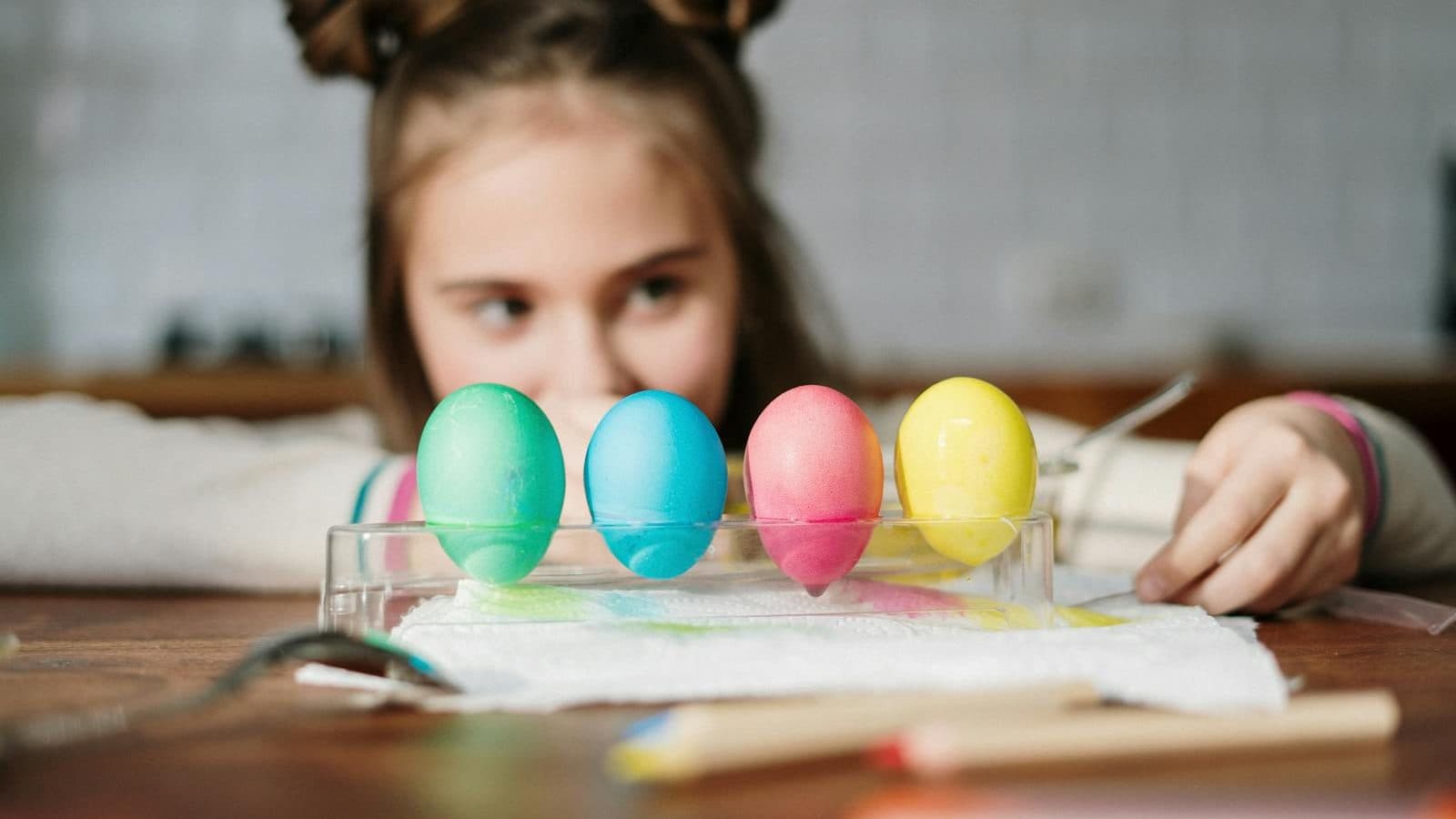 Four Colored Eggs on Palette Tray