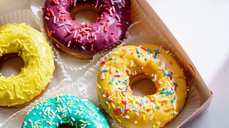 Two Doughnuts in Brown Box