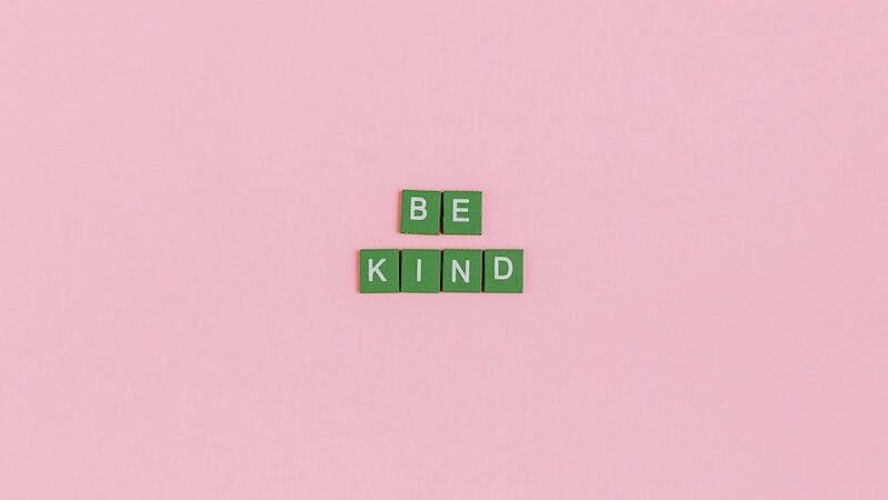 Be Kind Words on Pink Background