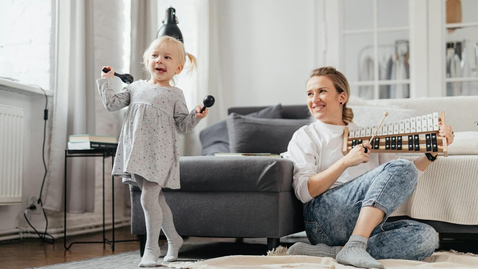 A Young Girl Dancing While Holding Maracas