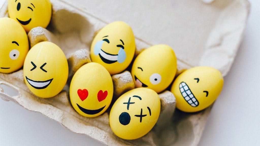 Yellow Painted Eggs With Various Facial Expressions