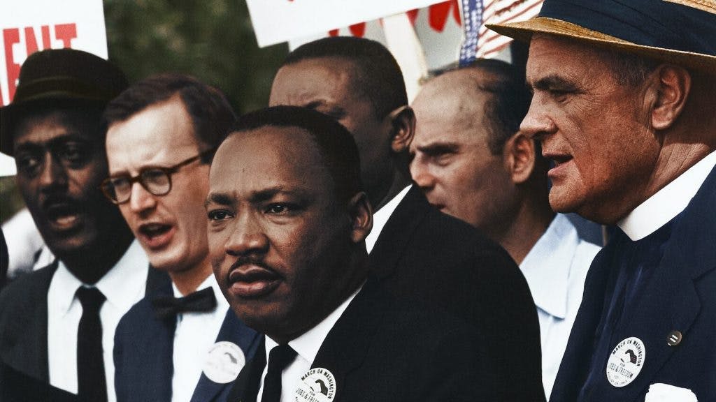 Dr. Martin Luther King, Jr. and Mathew Ahmann in a crowd of demonstrators at the March on Washington
