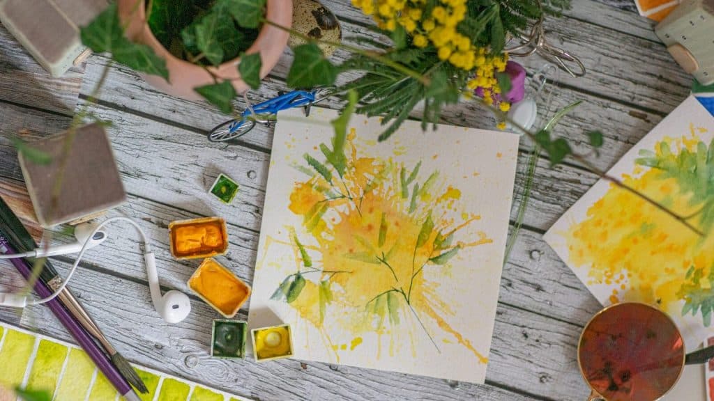 yellow flower on white paper