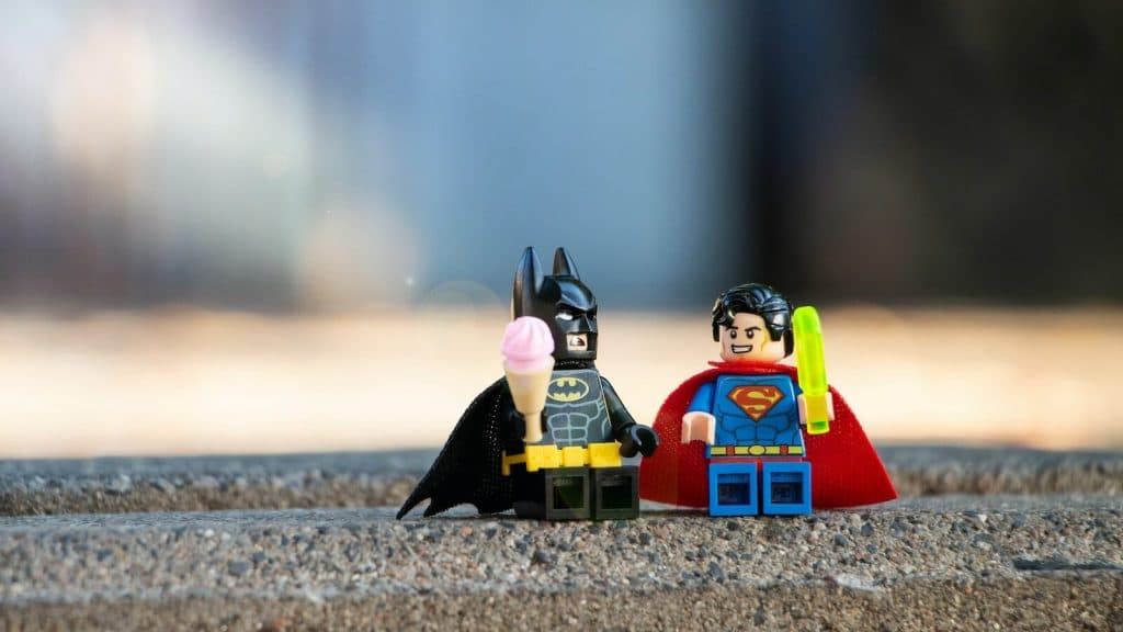 lego mini figure on brown sand