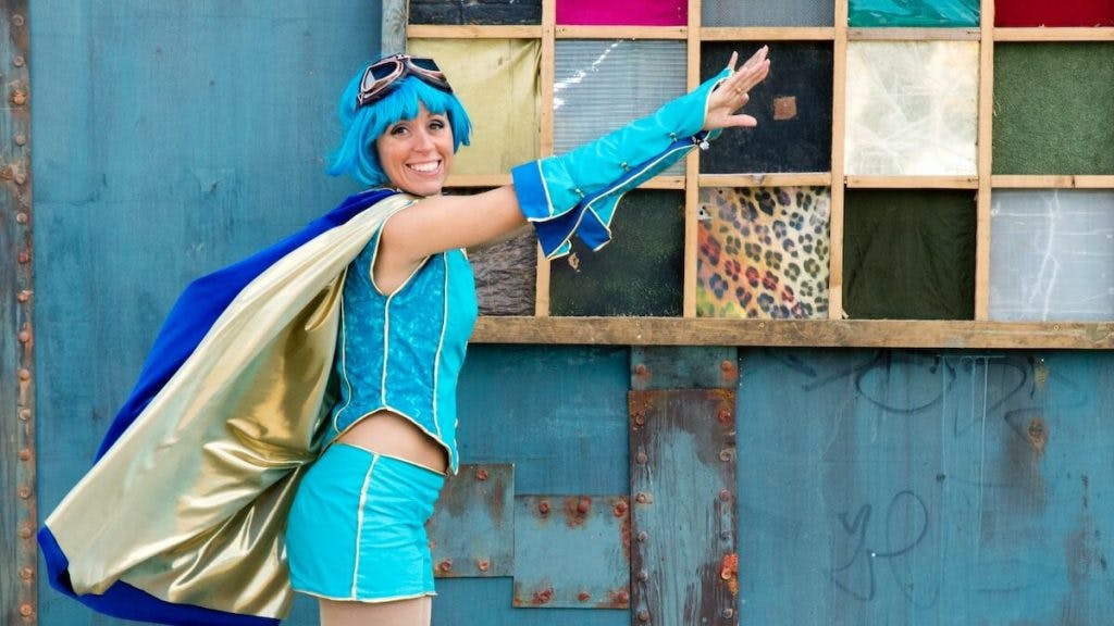 woman wearing anime costume about to fly position