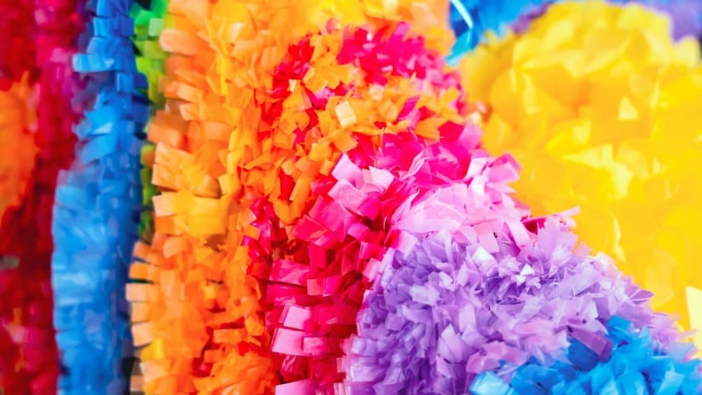 yellow pink and blue plastic toy