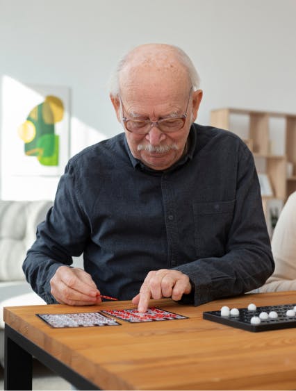 Old man play bingo card